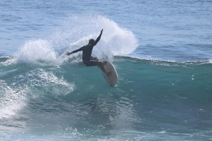 Weyser throwing spray on a powerful turn